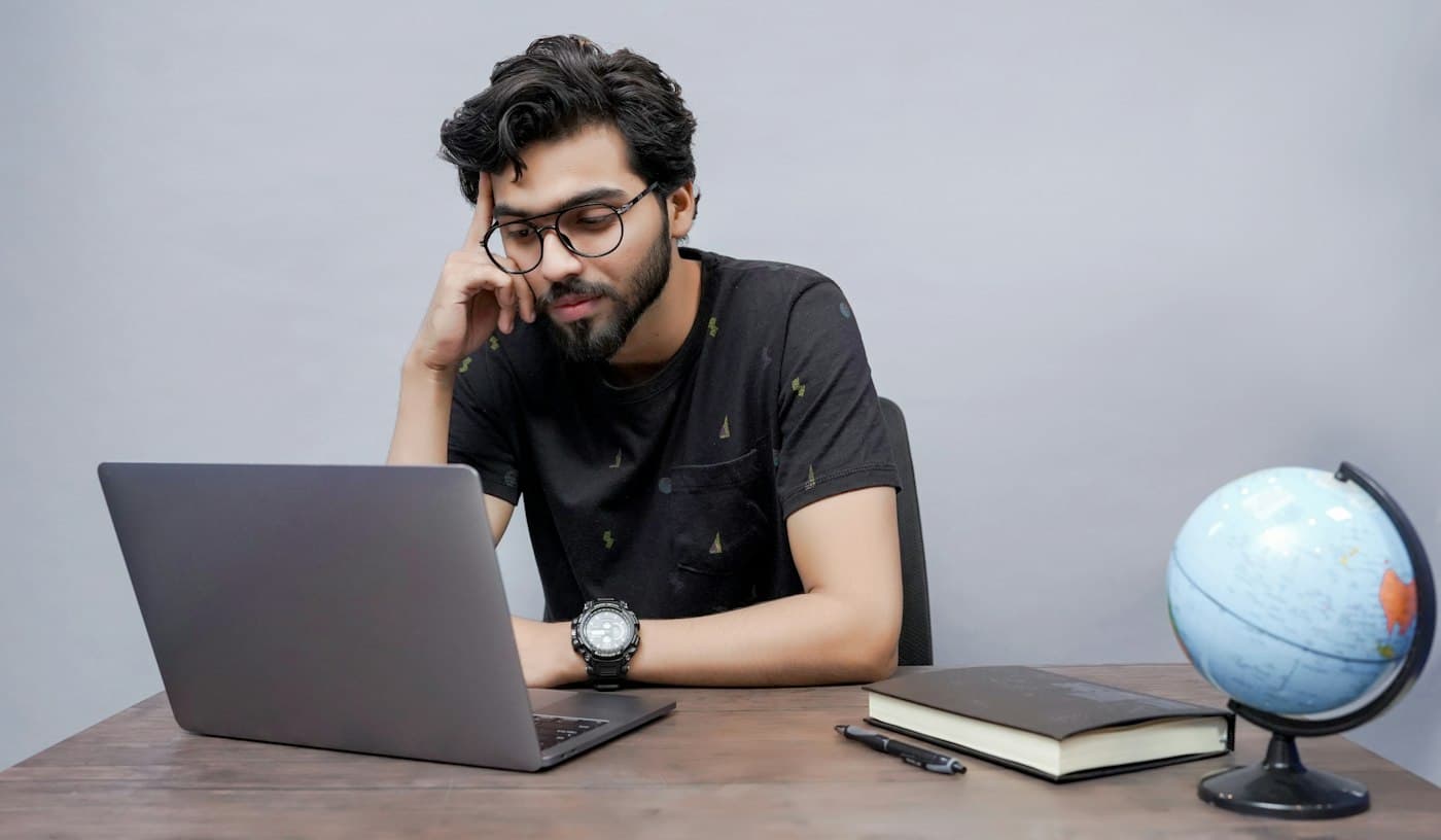 A student planning their studies on a laptop
